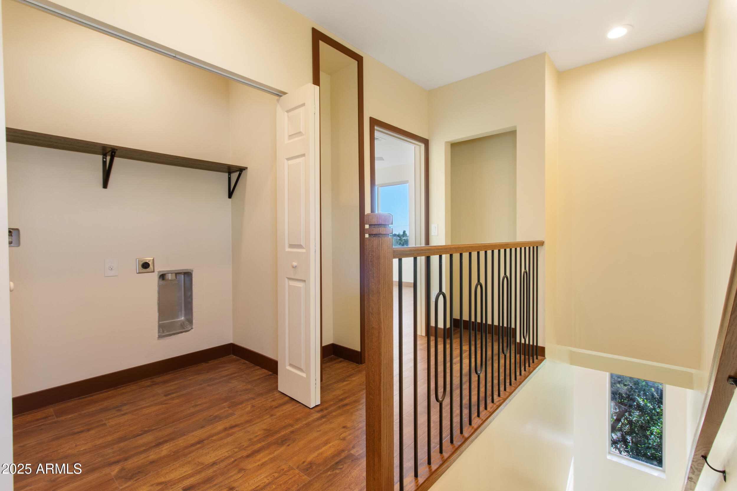 2014 West Lawrence Road Phoenix, AZ 85015 - Photo 16 of 24 a view of a hallway with wooden floor and entryway