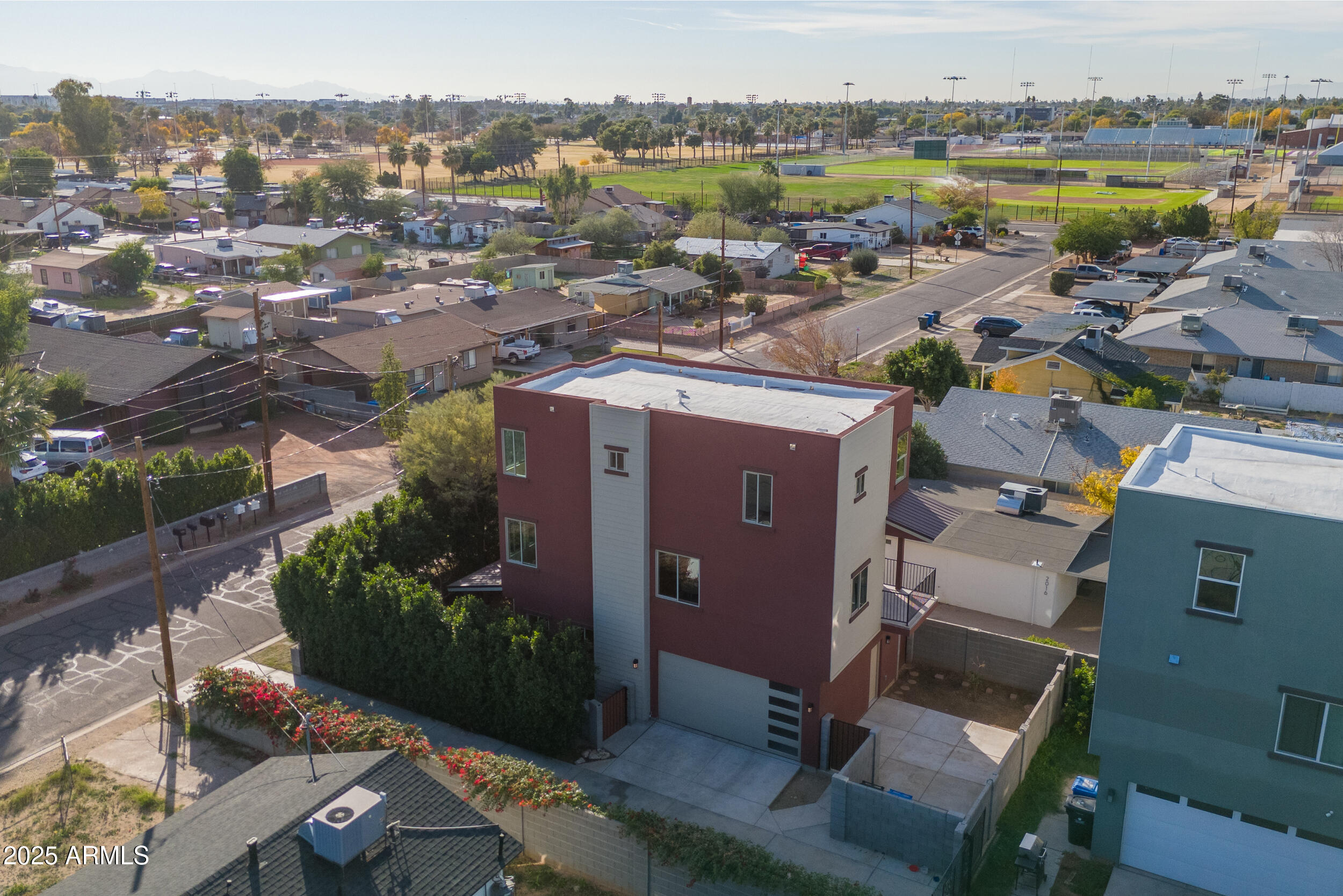 2014 West Lawrence Road Phoenix, AZ 85015 - Photo 3 of 24 an aerial view of a house with a lake view