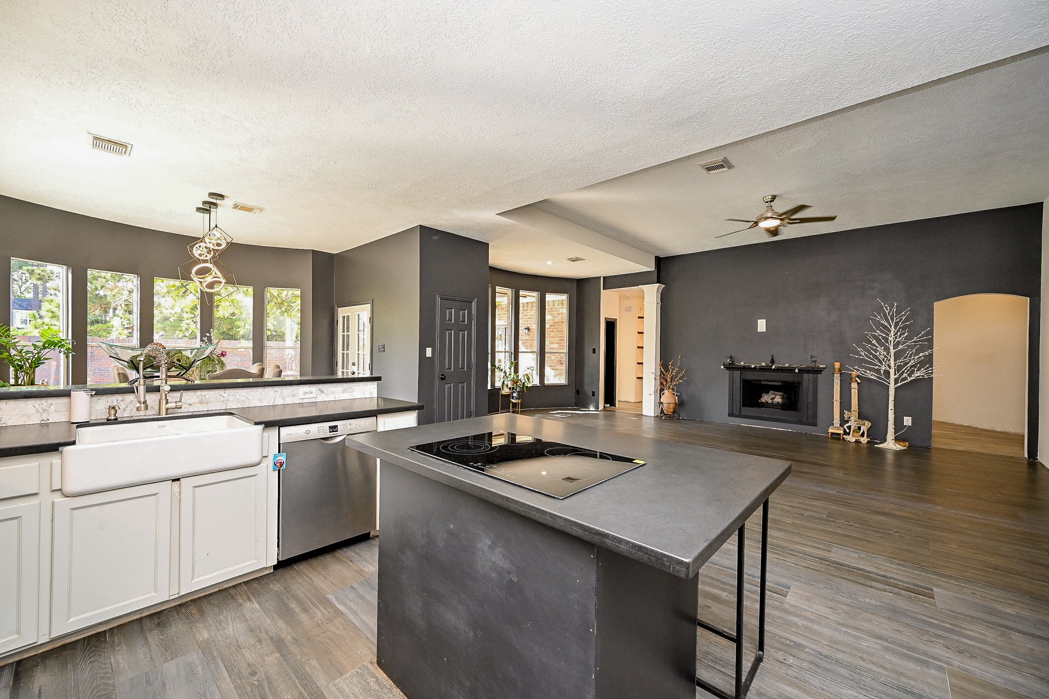 1331 Bishops Pl Drive Spring, TX 77379 - Photo 11 of 31 a kitchen with a table chairs sink and cabinets