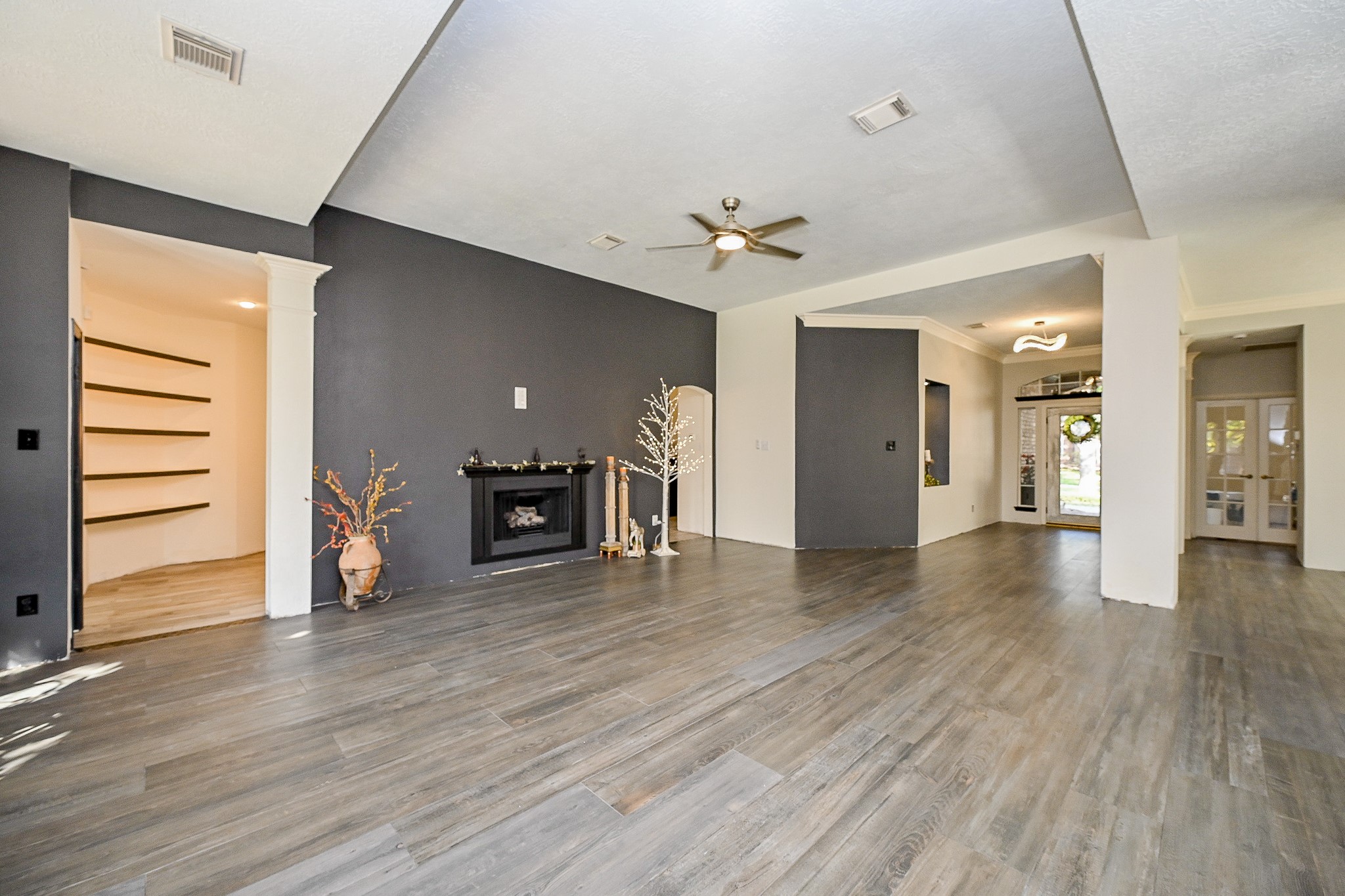 1331 Bishops Pl Drive Spring, TX 77379 - Photo 14 of 31 a view of a livingroom with a hall and a window