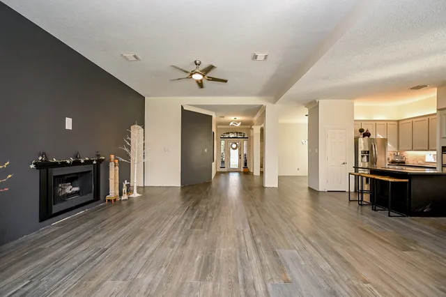 a view of a kitchen from the hallway