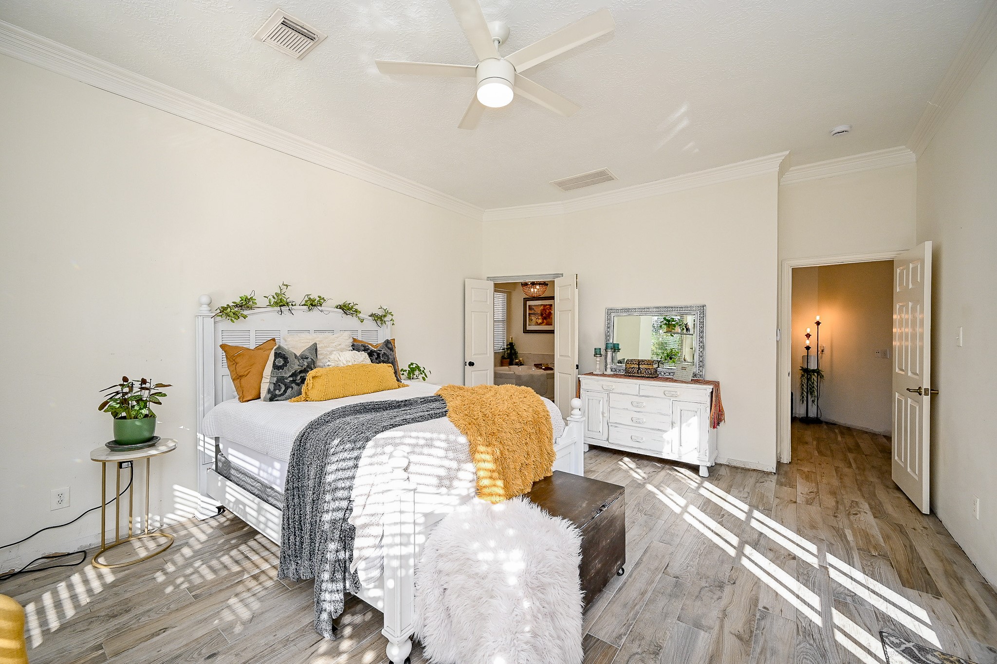 1331 Bishops Pl Drive Spring, TX 77379 - Photo 17 of 31 a bedroom with a bed and wooden floor