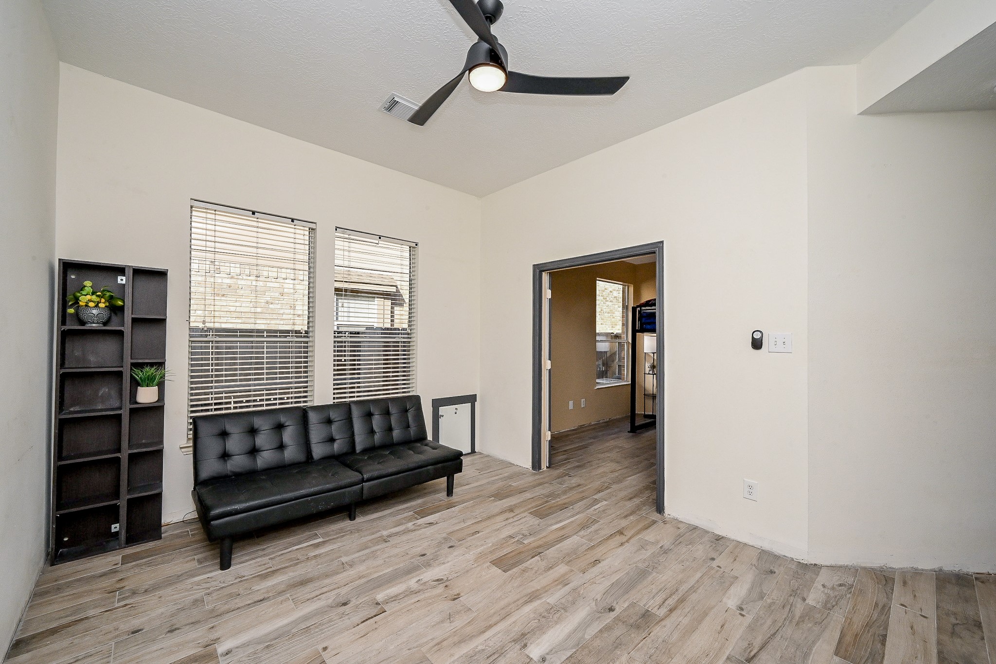 1331 Bishops Pl Drive Spring, TX 77379 - Photo 25 of 31 a view of wooden floor and windows in a room