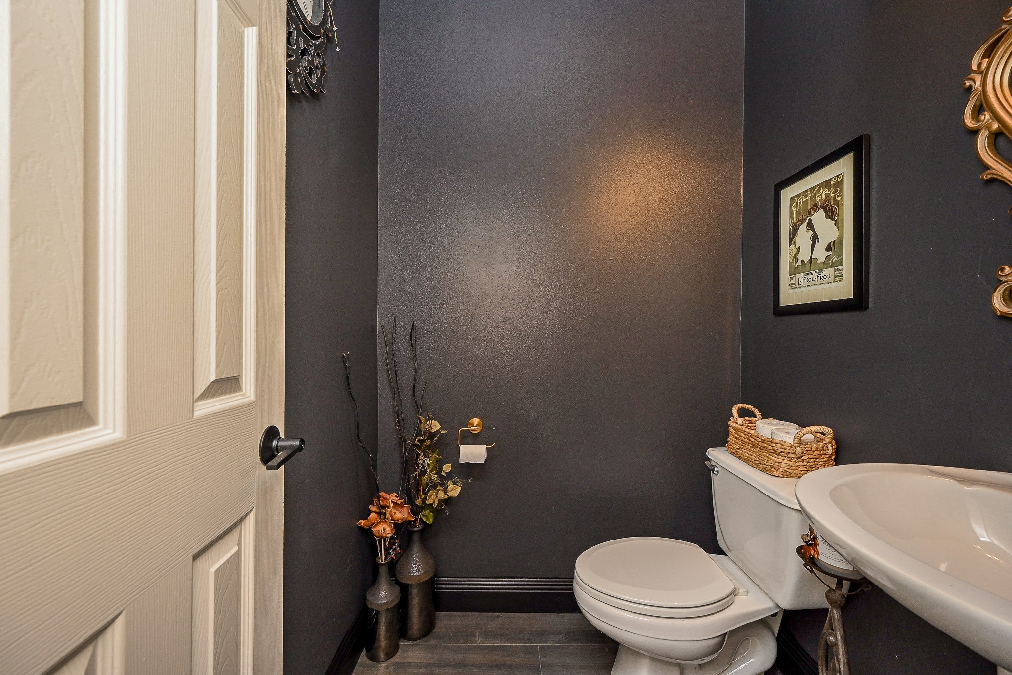 1331 Bishops Pl Drive Spring, TX 77379 - Photo 27 of 31 a white toilet sitting next to a bathroom sink