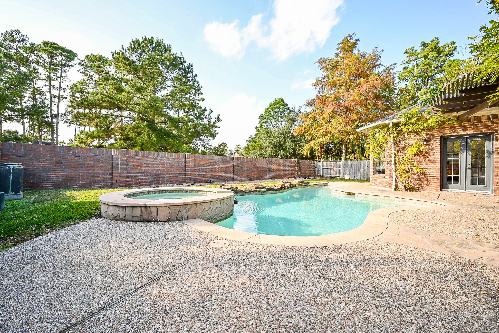 1331 Bishops Pl Drive Spring, TX 77379 - Photo 30 of 31 a view of a backyard with swimming pool
