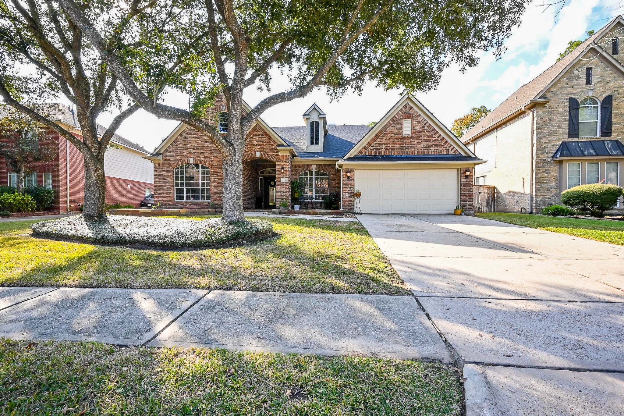 1331 Bishops Pl Drive Spring, TX 77379 - Photo 3 of 31 a view of a house with swimming pool and a yard
