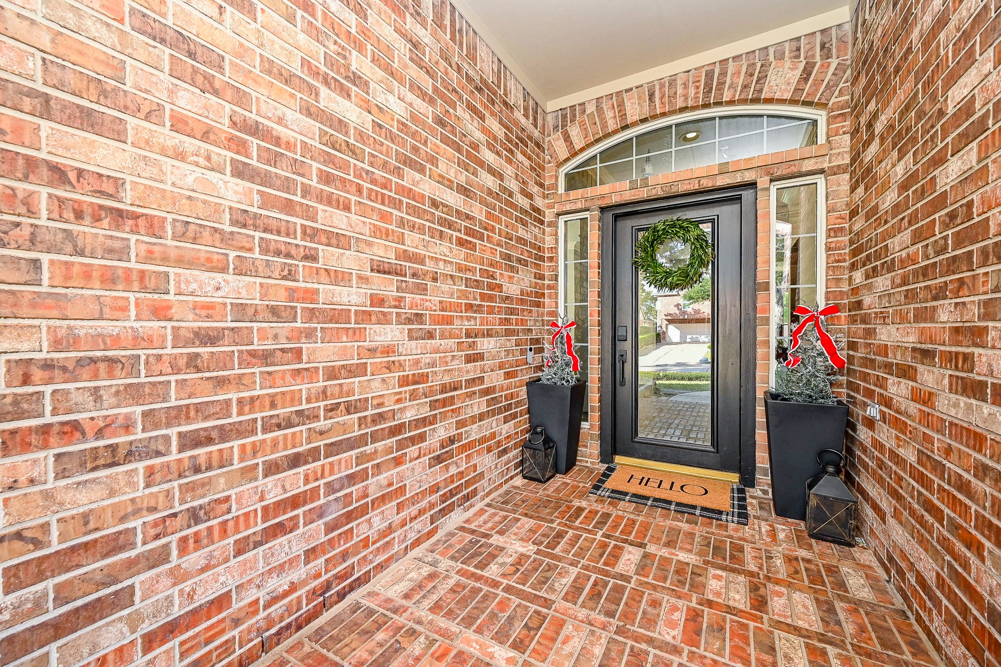 1331 Bishops Pl Drive Spring, TX 77379 - Photo 5 of 31 a view of a wooden door and a outdoor space