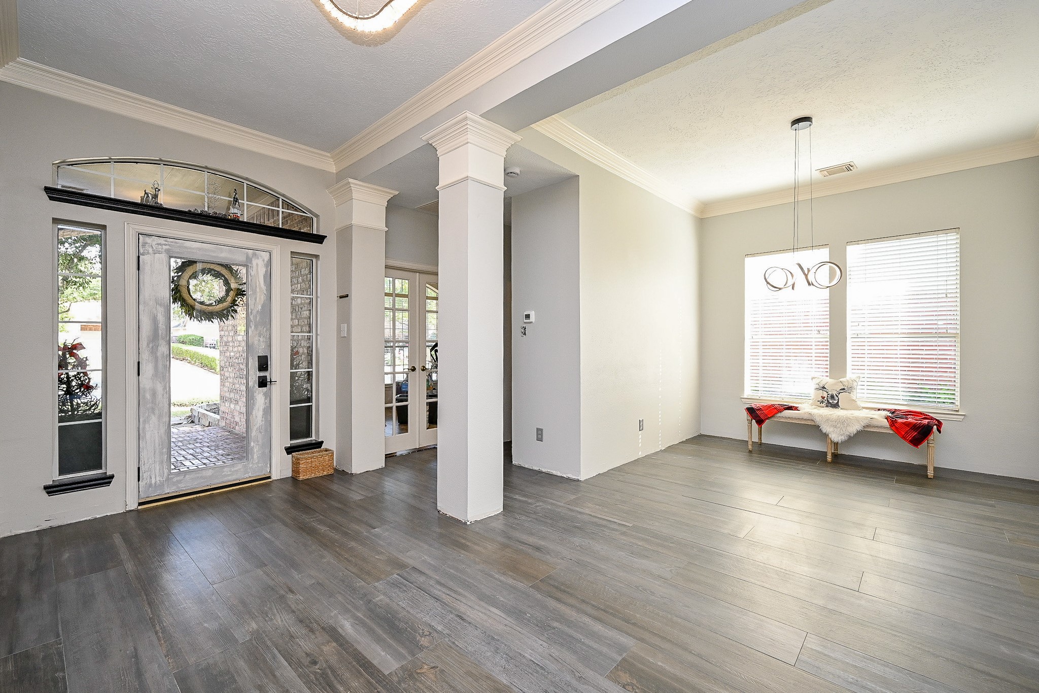 1331 Bishops Pl Drive Spring, TX 77379 - Photo 6 of 31 a view of an entryway with wooden floor and garden