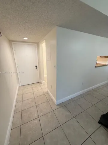 a view of staircase with railing and stairs