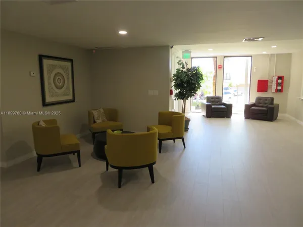 a living room with furniture and a couch