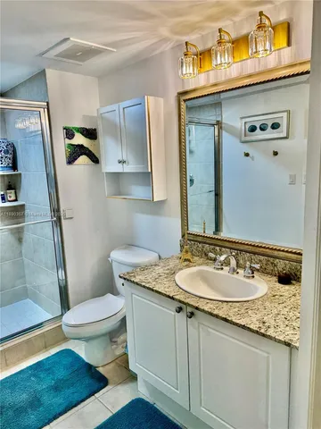 a view of a lake with a city