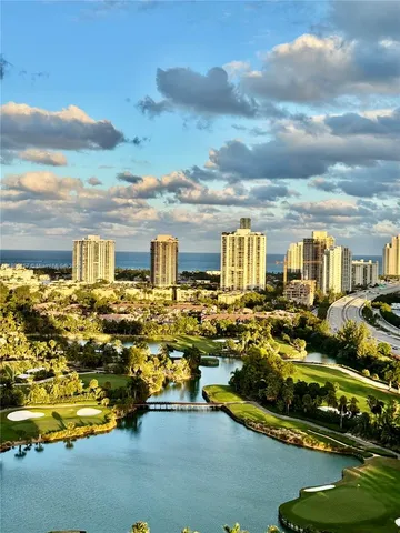 a building outdoor space with patio furniture and potted plants