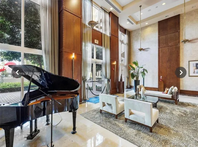 a view of a patio with dining table and chairs