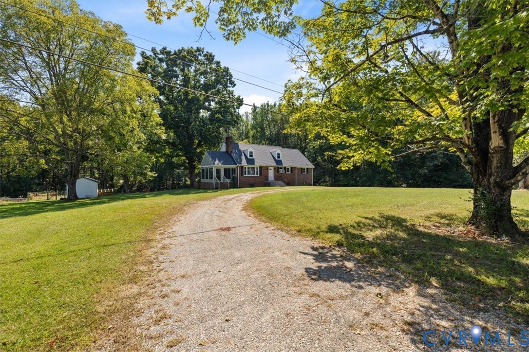 3577 Old Buckingham Road Powhatan, VA 23139 - Photo 11 of 36 Brick and siding exterior with a covered porch