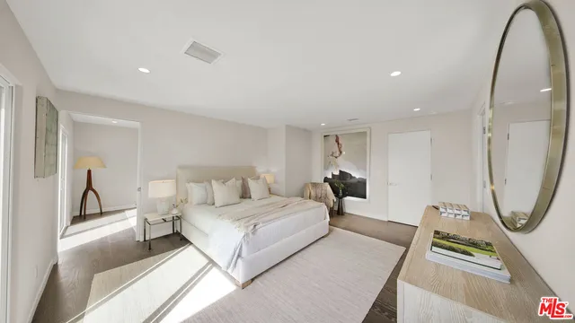 a bed room with a bed furniture and a window