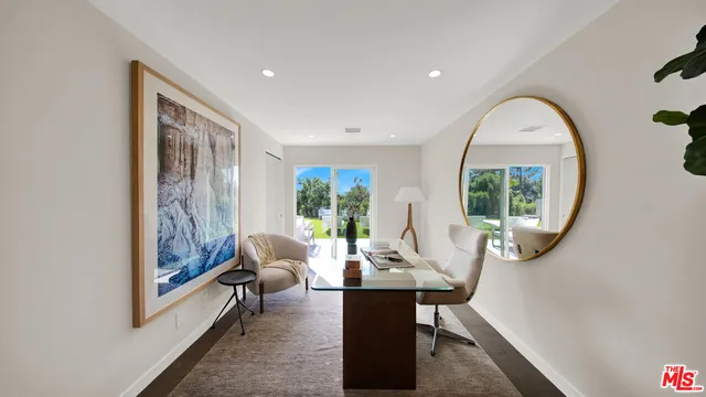 a view of a balcony with furniture