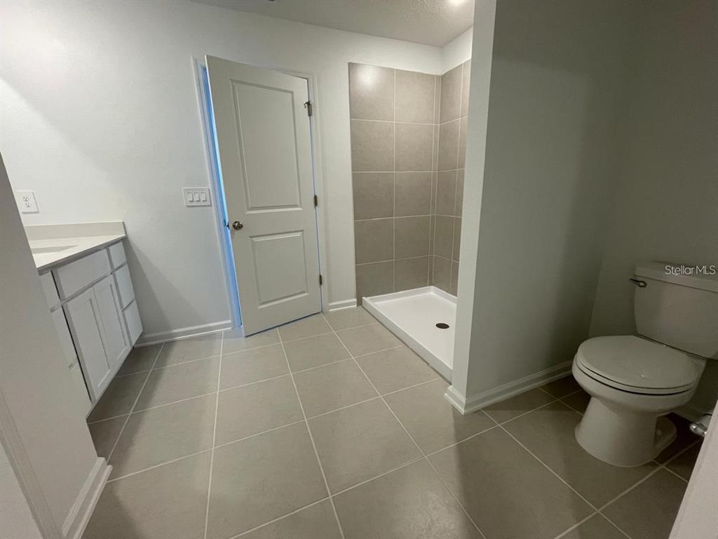 3675 Hardman Dr Lake Lake Wales, FL 33853 - Photo 6 of 11 a bathroom with a toilet and a shower