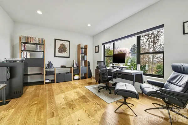 a aerial view of a house with a big yard