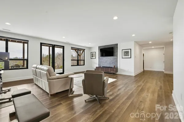 a backyard of a house with yard and outdoor seating