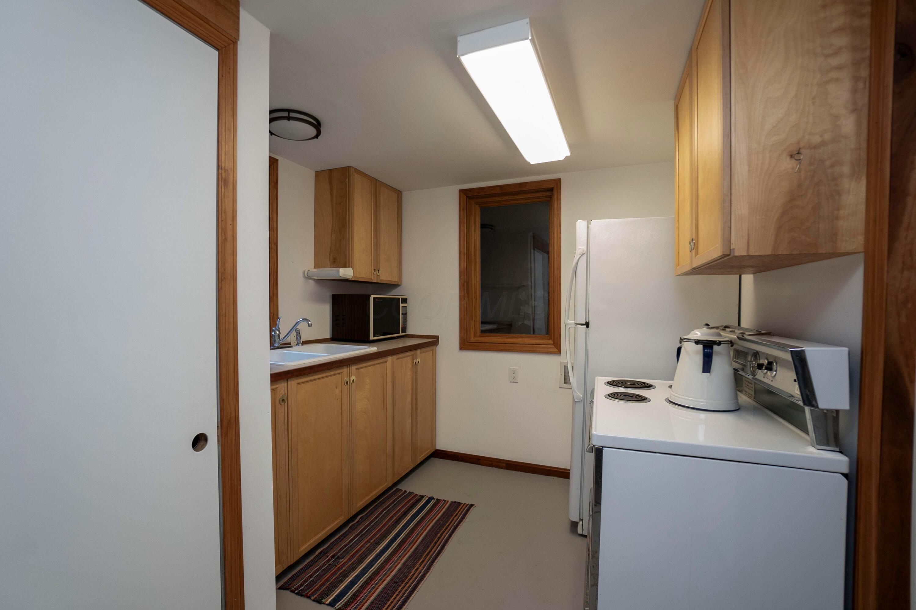25779 Bailey Road Rockbridge, OH 43149 - Photo 63 of 89 1st Floor Elevator and Kitchen