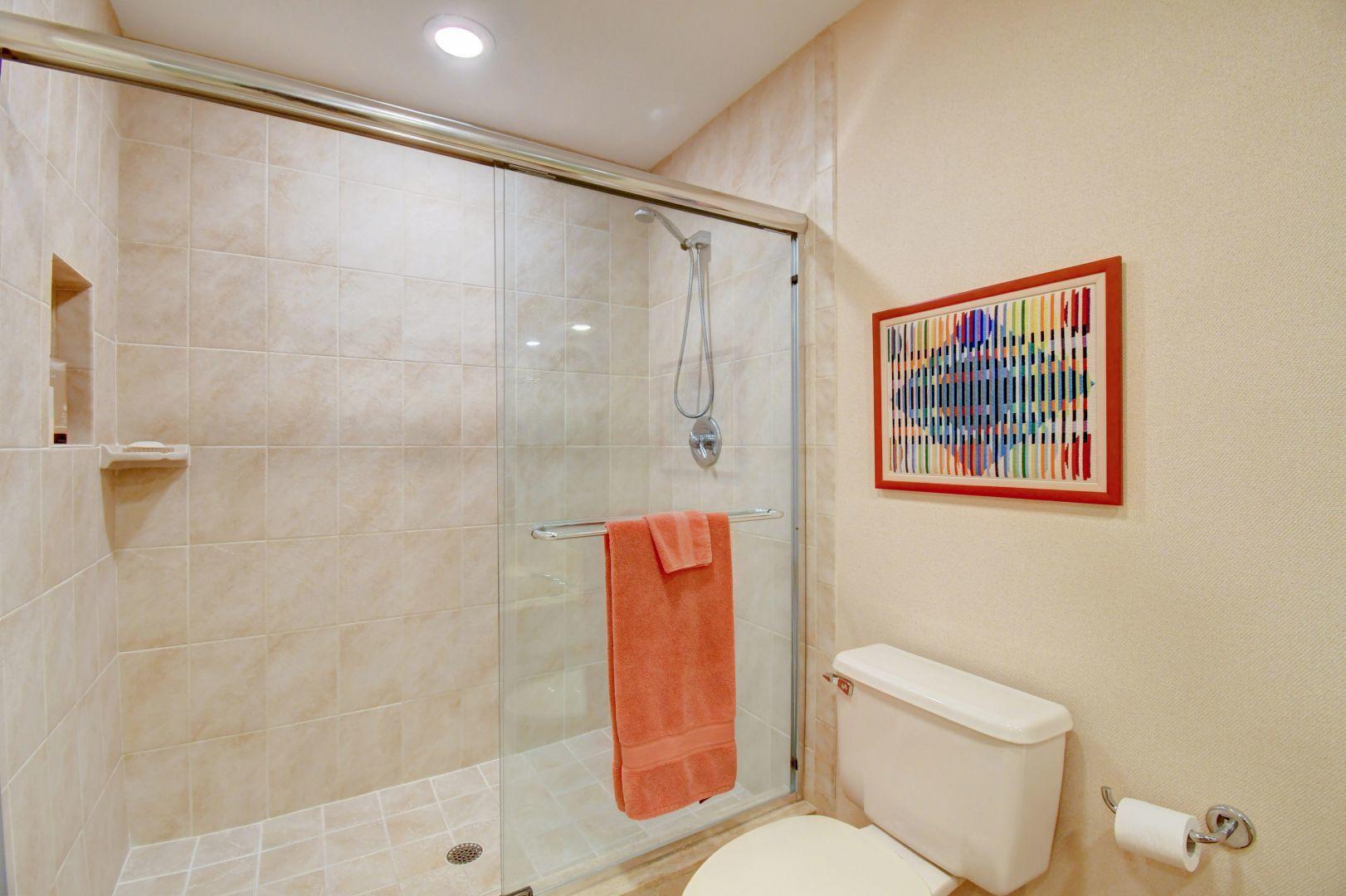 23383 Water Circle Boca Raton, FL 33486 - Photo 29 of 35 a white toilet sitting next to a bathroom shower