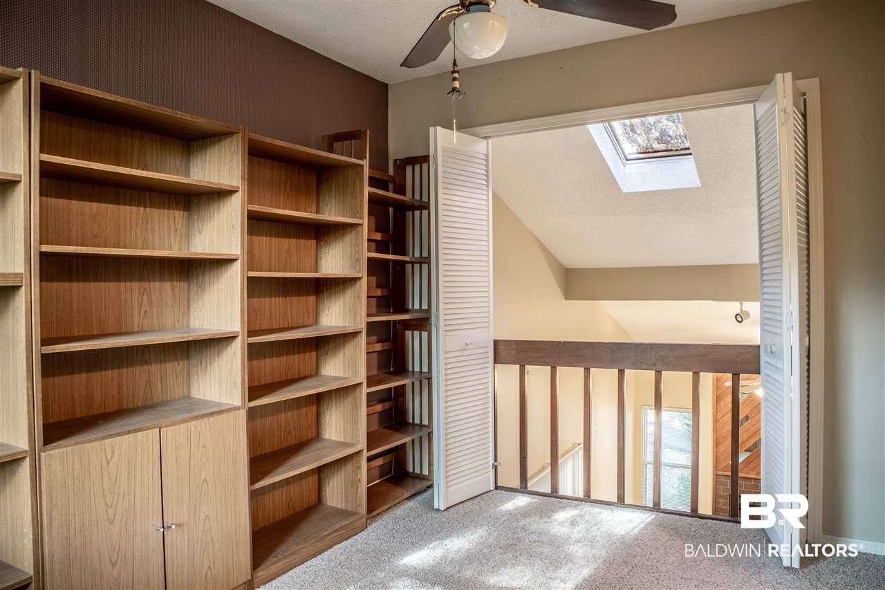 1831 Spring Brook Court Mobile, AL 36609 - Photo 22 of 28 Loft overlooking fireplace