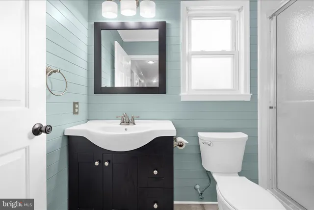 a view of yard with swimming pool and trees