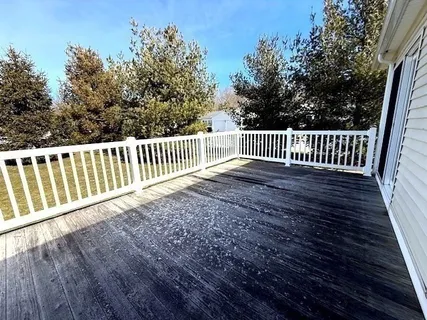 a view of deck and garden