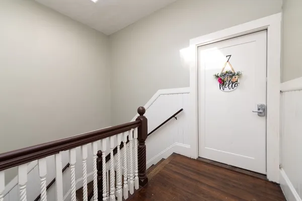 a view of entryway with wooden floor