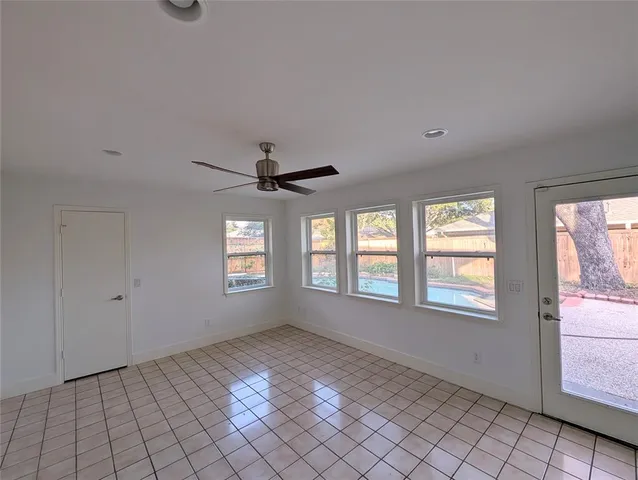 a view of an empty room and window