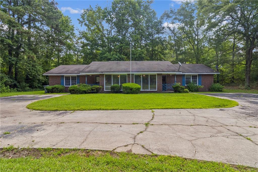 151 Highway 36 Barnesville, GA 30204 - Photo 1 of 1 a view of a house with a yard