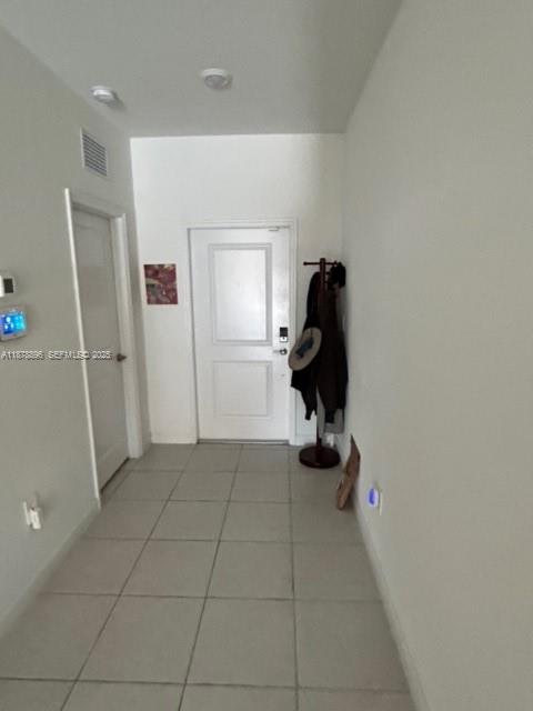 11914 Southwest 241st Street Homestead, FL 33032 - Photo 15 of 25 a view of a closet with storage