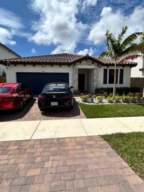 11914 Southwest 241st Street Homestead, FL 33032 - Photo 25 of 25 a view of a car parked in front of a building