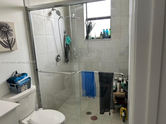 11914 Southwest 241st Street Homestead, FL 33032 - Photo 6 of 25 a bathroom with a toilet and a shower