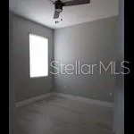 en empty room with windows
