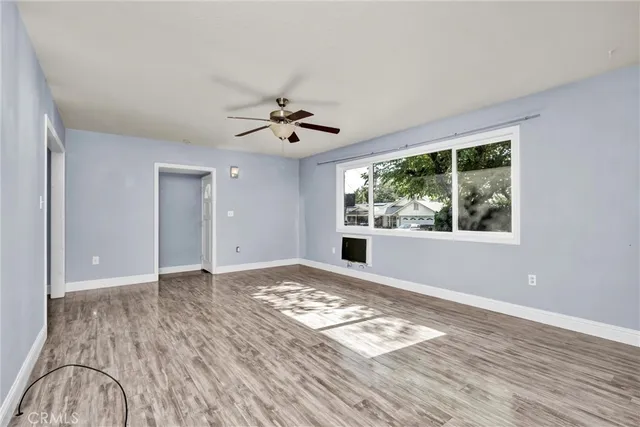 a view of an empty room and window