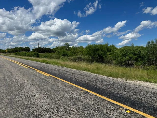 a view of a lake from a yard