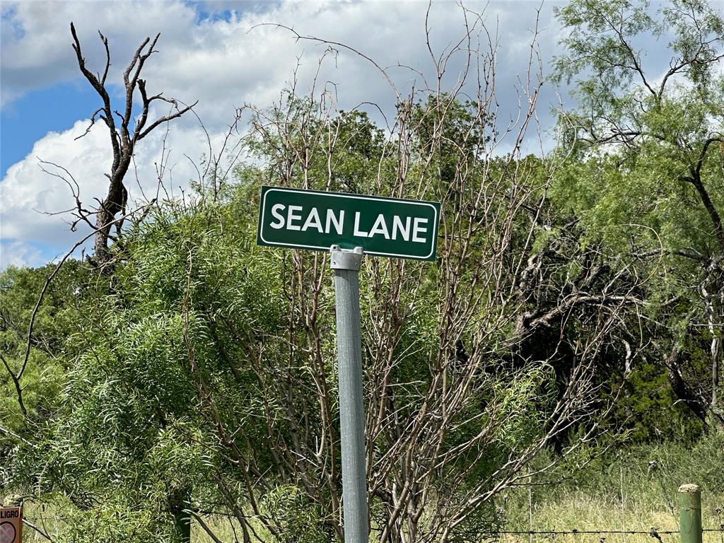 10 Fm 585 Bangs, TX 76823 - Photo 5 of 30 a sign broad in front of the tree