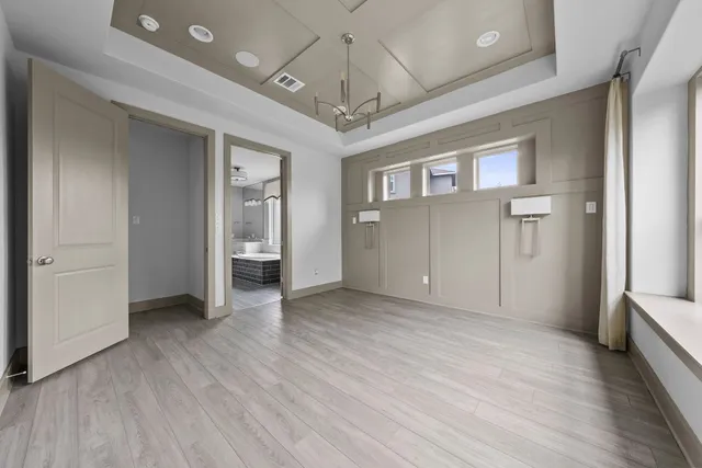 a view of an empty room and window