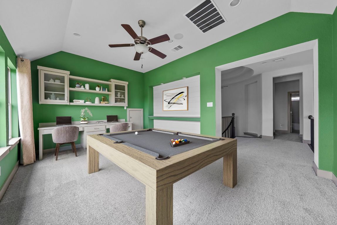 8108 Turning Leaf Circle Lago Vista, TX 78645 - Photo 7 of 40 Upstairs, the spacious game room offers built-in desk space, creative accents, and all the flexibility you need—whether that’s movie nights, work-from-home, or everything in between. - Virtually Enhanced