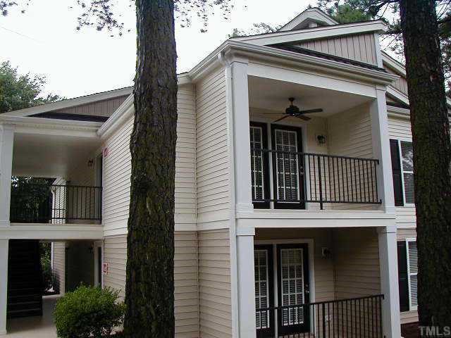 2216 Myron Drive, Unit 101 Raleigh, NC 27607 - Photo 6 of 7 front view of a house with a balcony