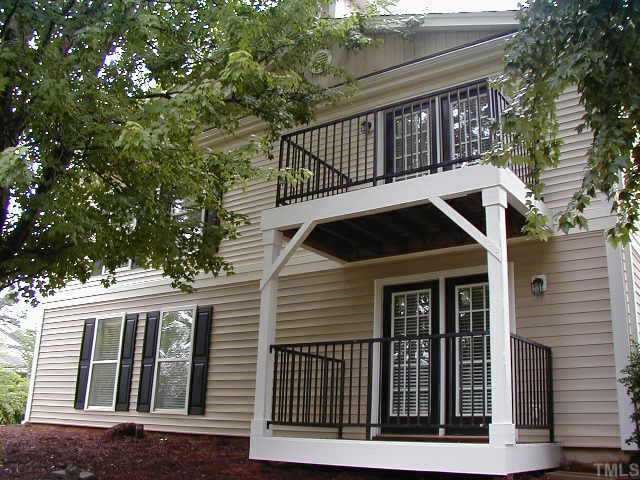 2216 Myron Drive, Unit 101 Raleigh, NC 27607 - Photo 7 of 7 a front view of a house with balcony
