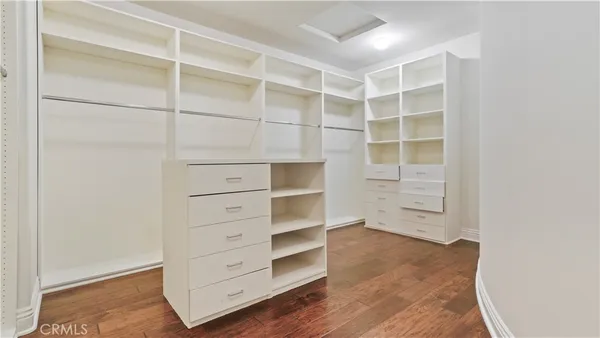 a view of an empty walk in closet