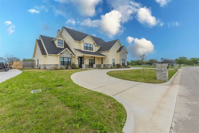 a view of a house with a swimming pool