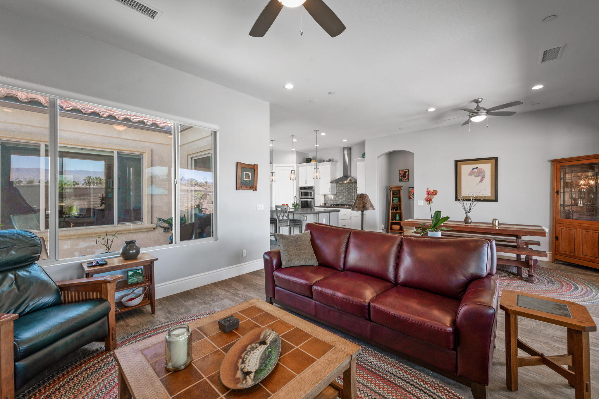 49 Cabernet Rancho Mirage, CA 92270 - Photo 14 of 40 a living room with furniture and a large window