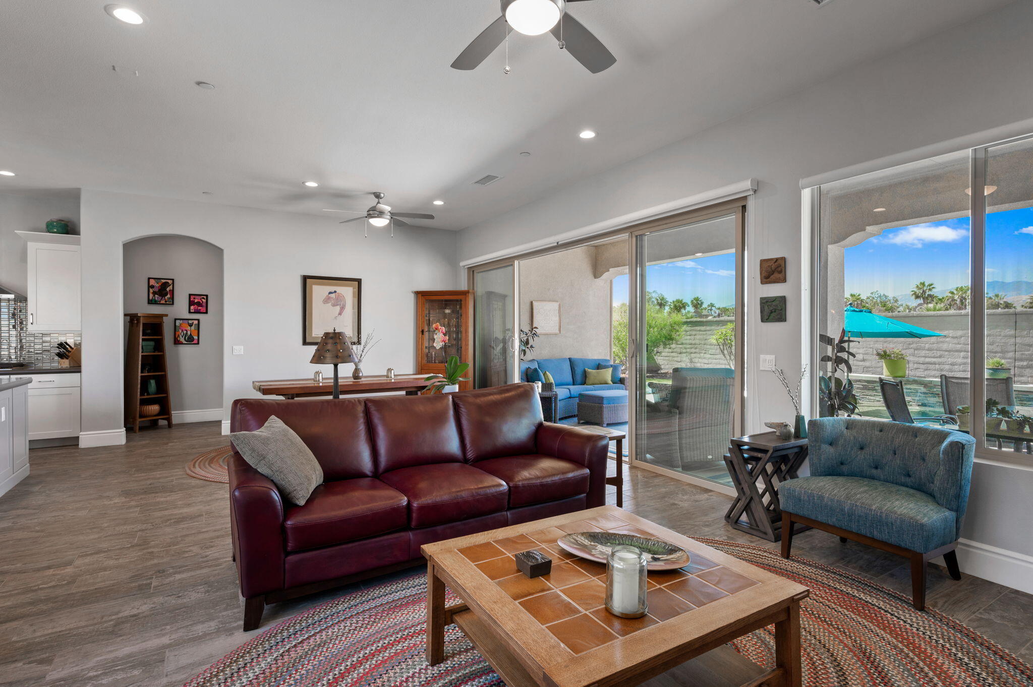 49 Cabernet Rancho Mirage, CA 92270 - Photo 15 of 40 a living room with furniture and a large window
