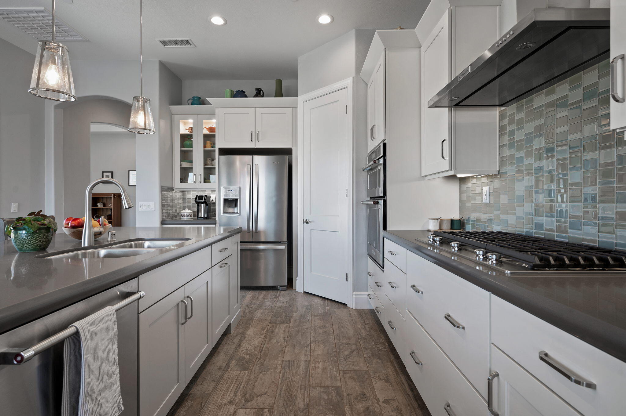 49 Cabernet Rancho Mirage, CA 92270 - Photo 18 of 40 a kitchen with stainless steel appliances a sink stove and refrigerator