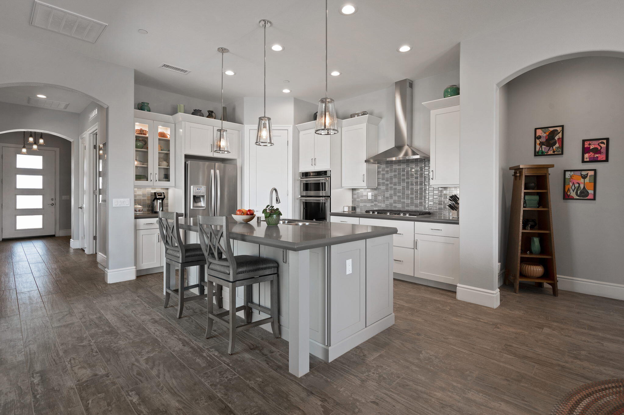 49 Cabernet Rancho Mirage, CA 92270 - Photo 3 of 40 a large kitchen with a table and chairs