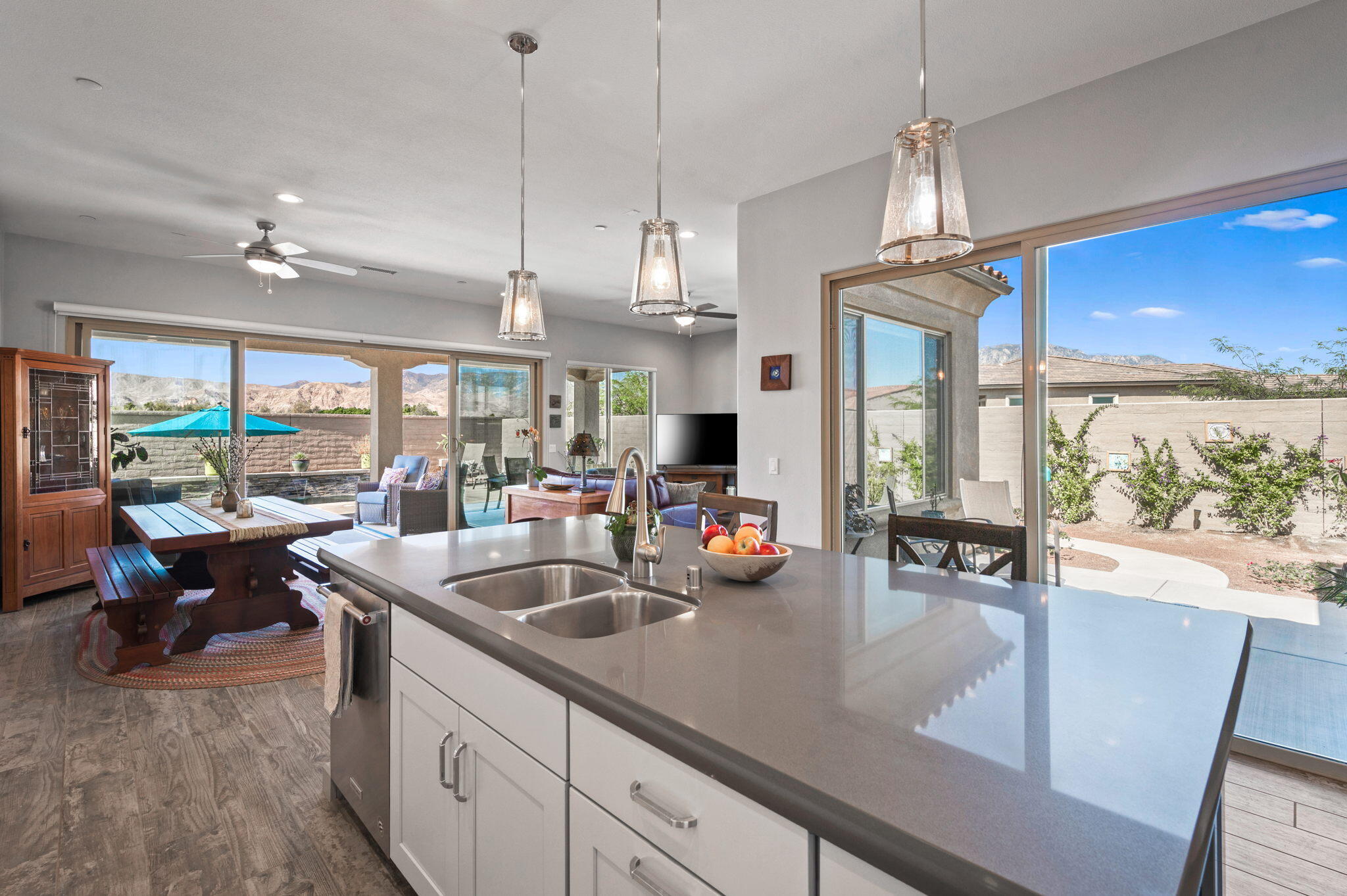 49 Cabernet Rancho Mirage, CA 92270 - Photo 5 of 40 a kitchen with sink refrigerator and large window