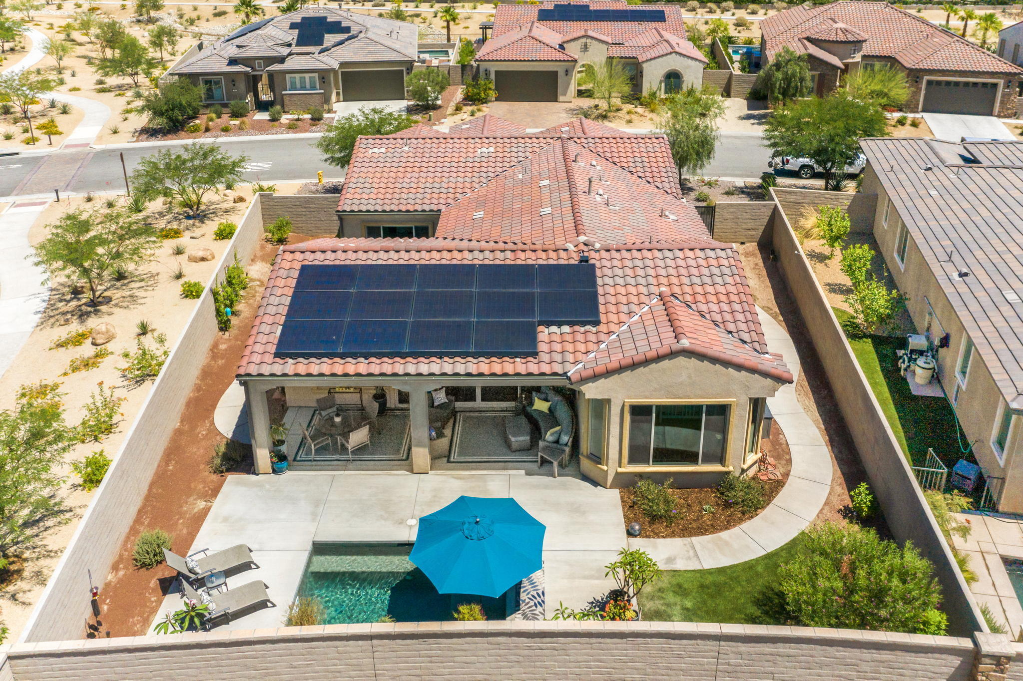 49 Cabernet Rancho Mirage, CA 92270 - Photo 6 of 40 a front view of a house with garden